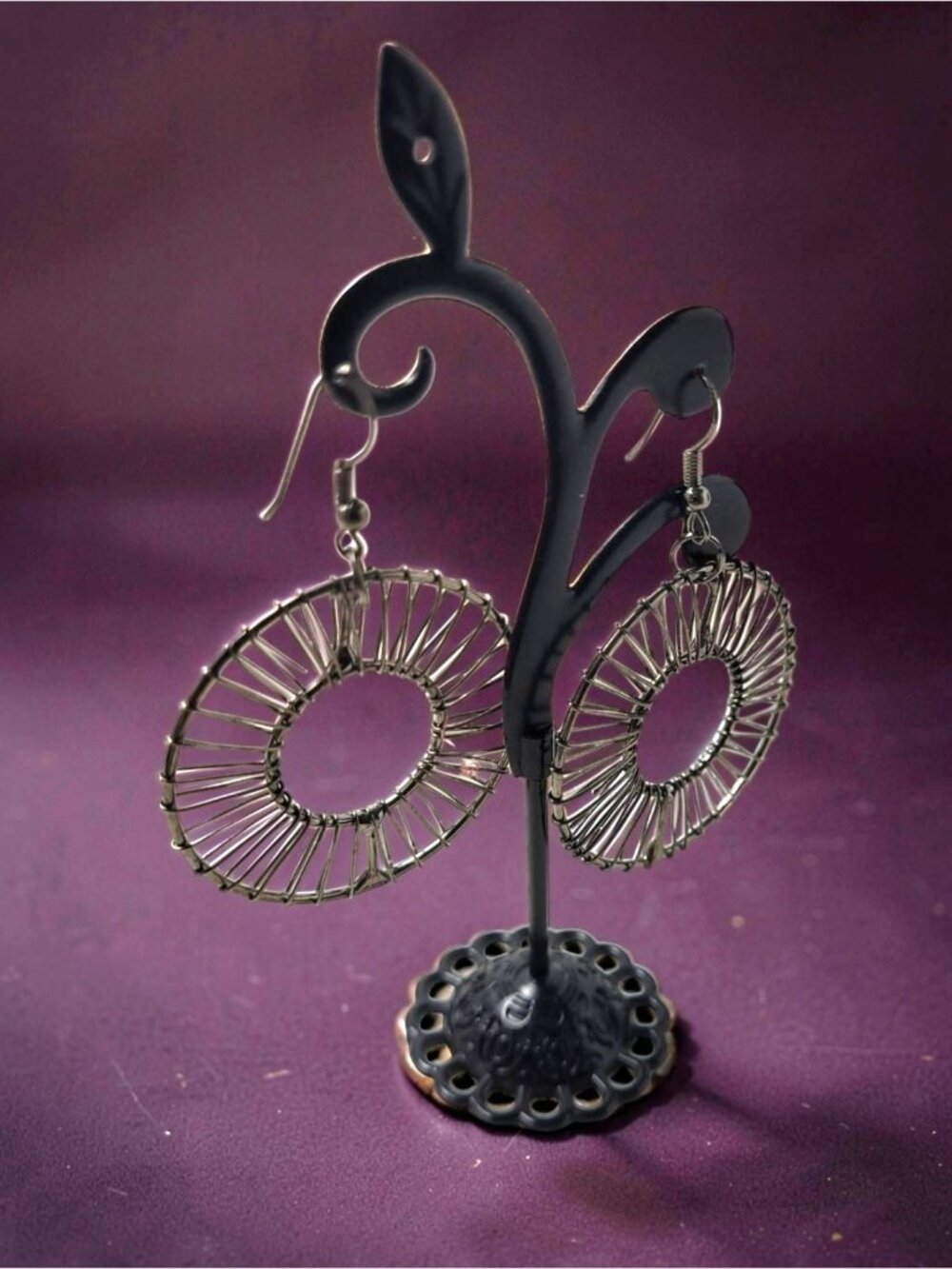 Vintage silver,gray toned wire-wrapped hoop dangle earrings featuring a sunburst